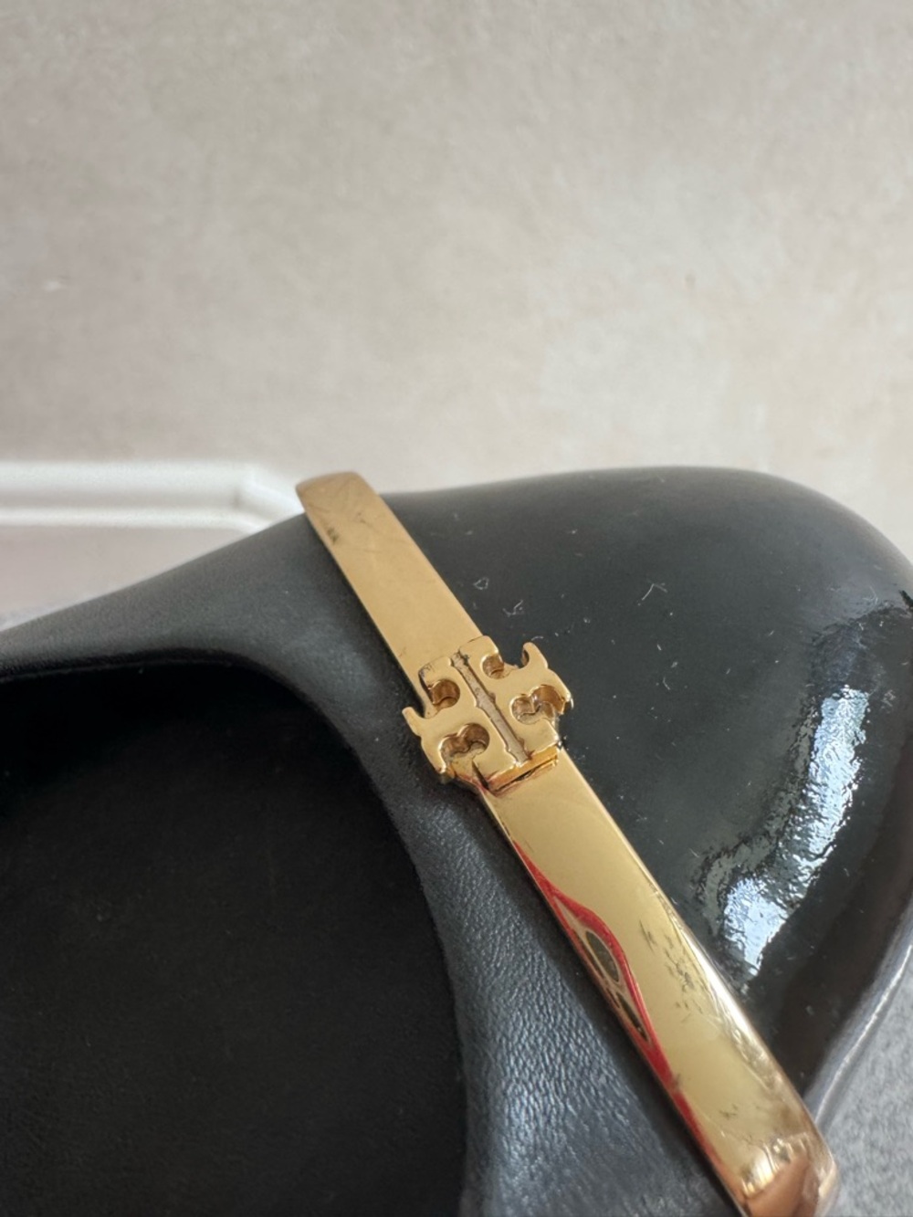 Tory Burch Black Hair Accessory with Gold Logo Bar